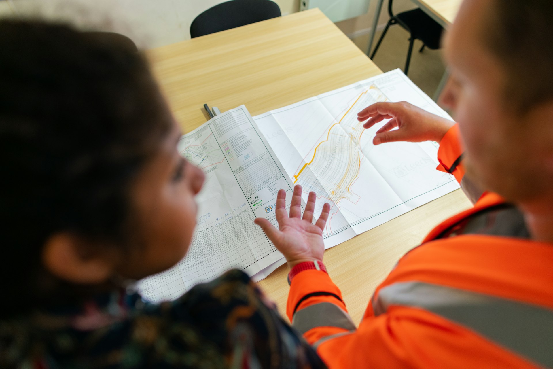 EAJ Services ownership reviewing a project together